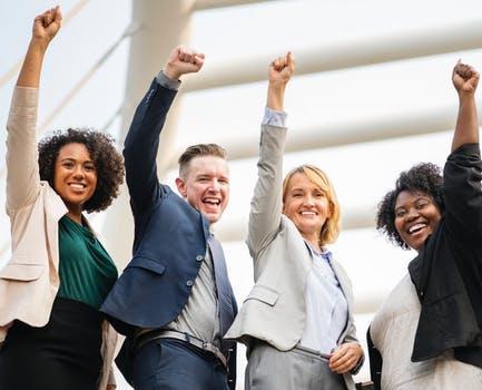 Office workers celebrating